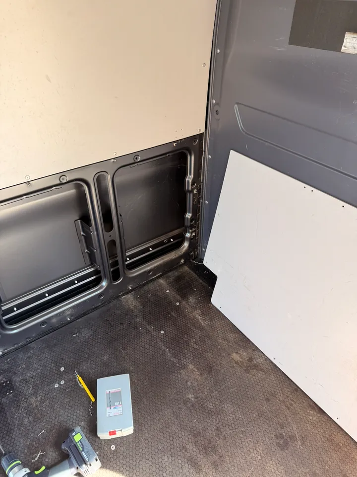 Panels parked against the bulkhead as they came off.