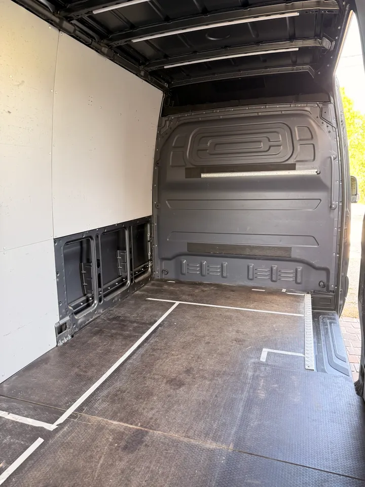 The first tape lines of the layout on the floor.
