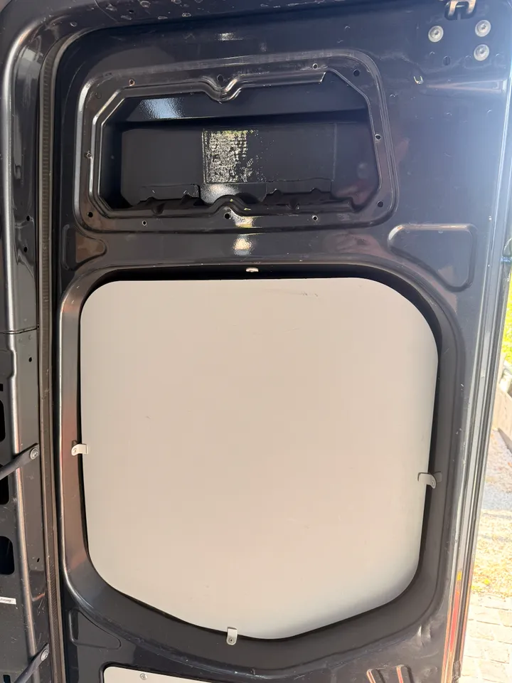 The rear doors have their own panels, and their own rivets.