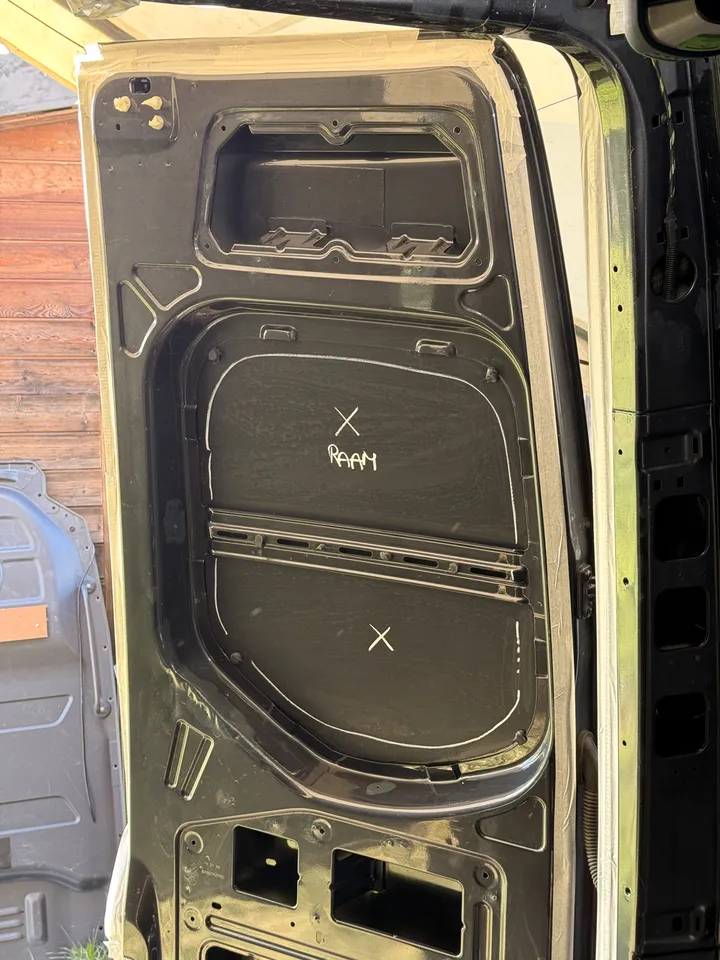 White marker on the door. RAAM is Dutch for window.